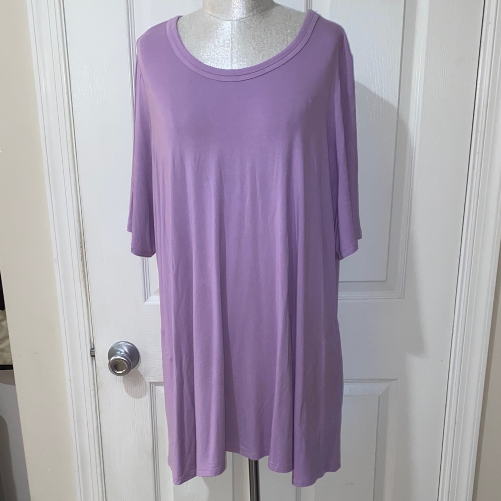 Logo by Lori Goldstein Tunic